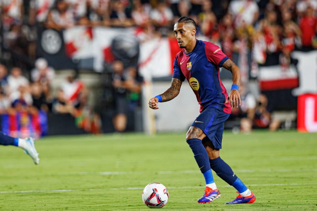 Raphinha in action for Barcelona against Bayern Munich in the Champions League.